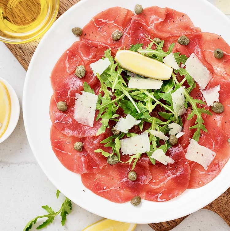 Beef carpaccio with parmesan and arugola - Bubble Bar Monaco — breakfast, burgers, pizza & pelmeni delivery