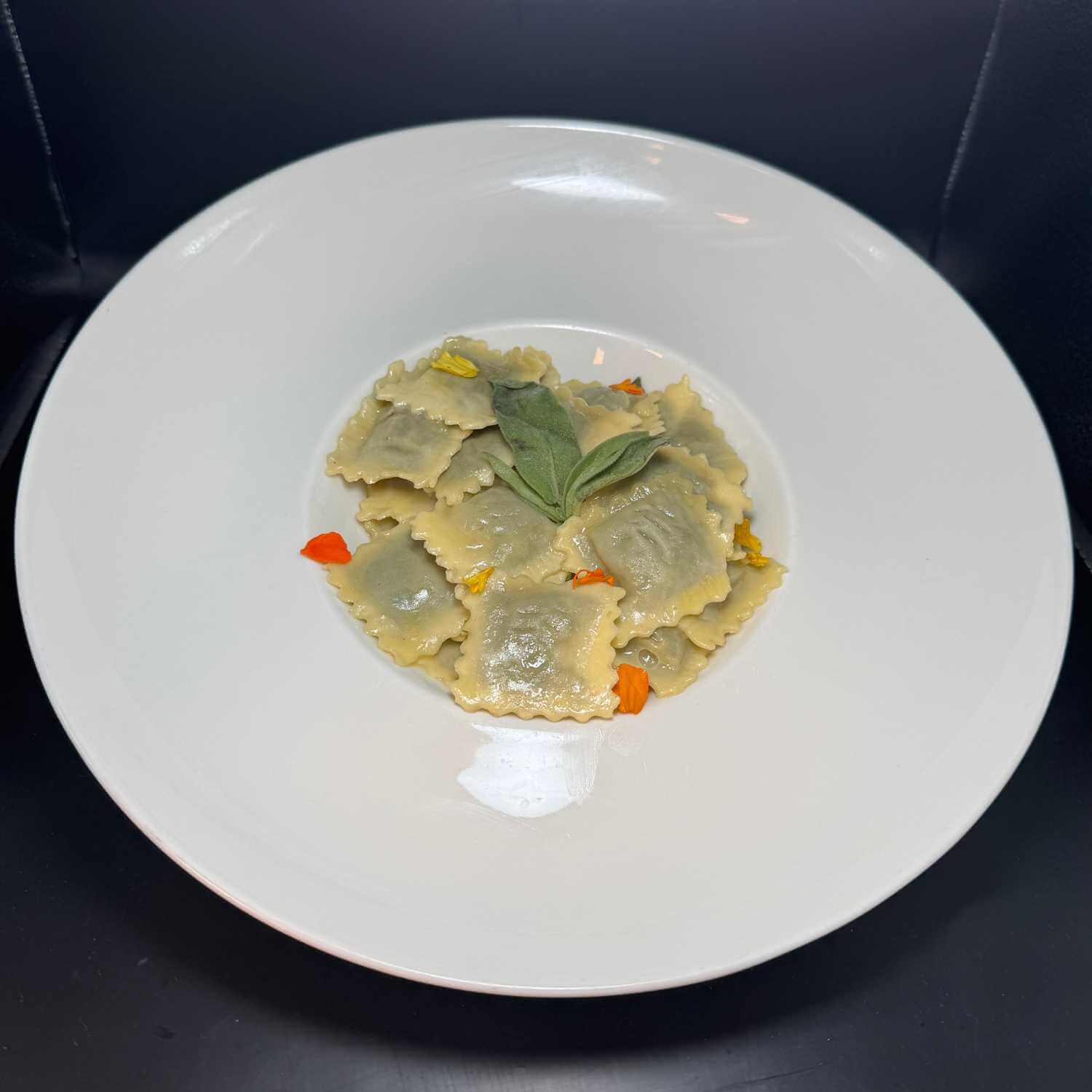 Borage ravioli with sage butter - Huit et Demi Food Delivery | Gourmet Italian & French Cuisine in Monaco