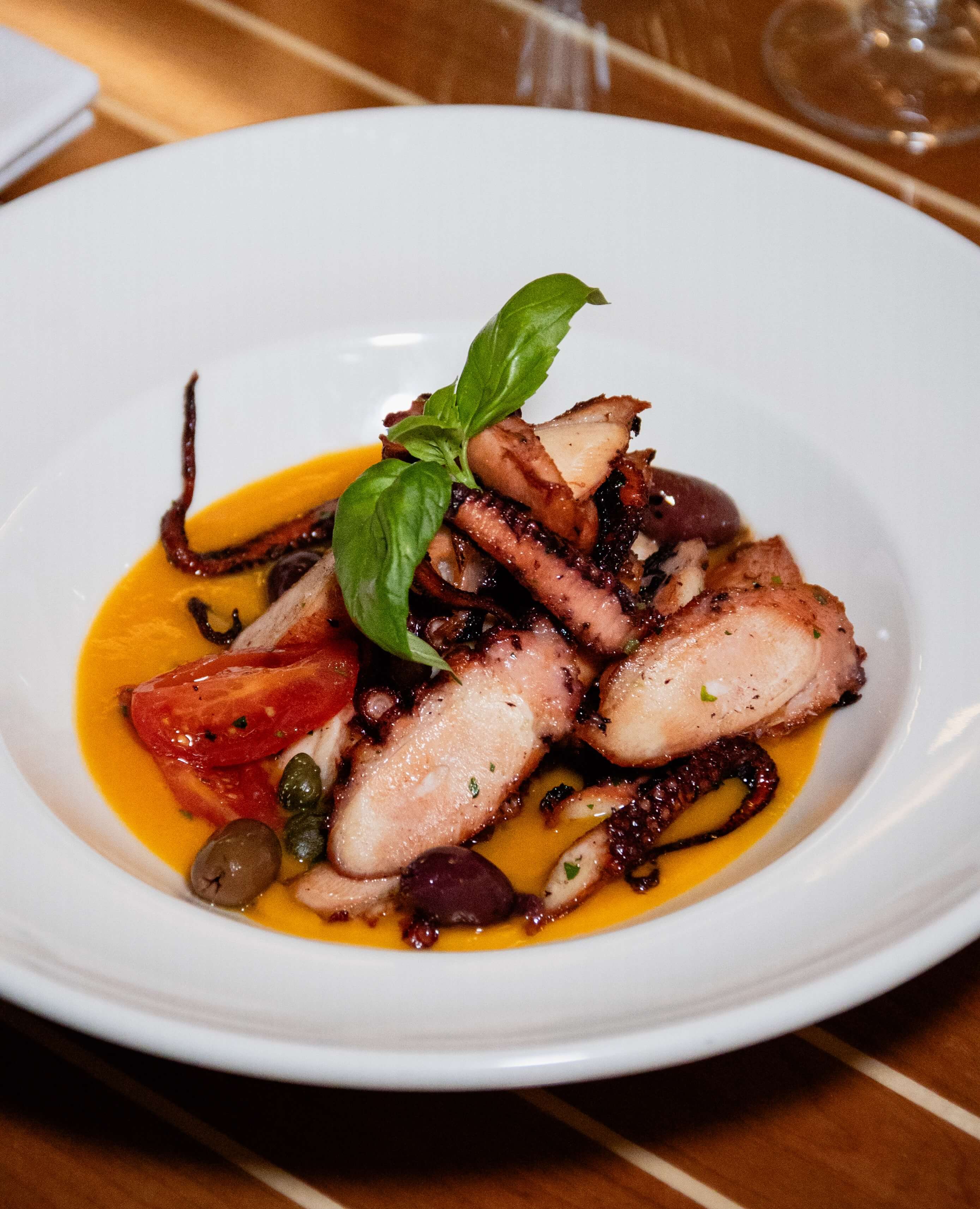 Octopus, sweet potatoes puree, olives, cherry tomatoes and capers - La Saliere | Italian & Mediterranean Food Delivery in Monaco, Cap-d'Ail