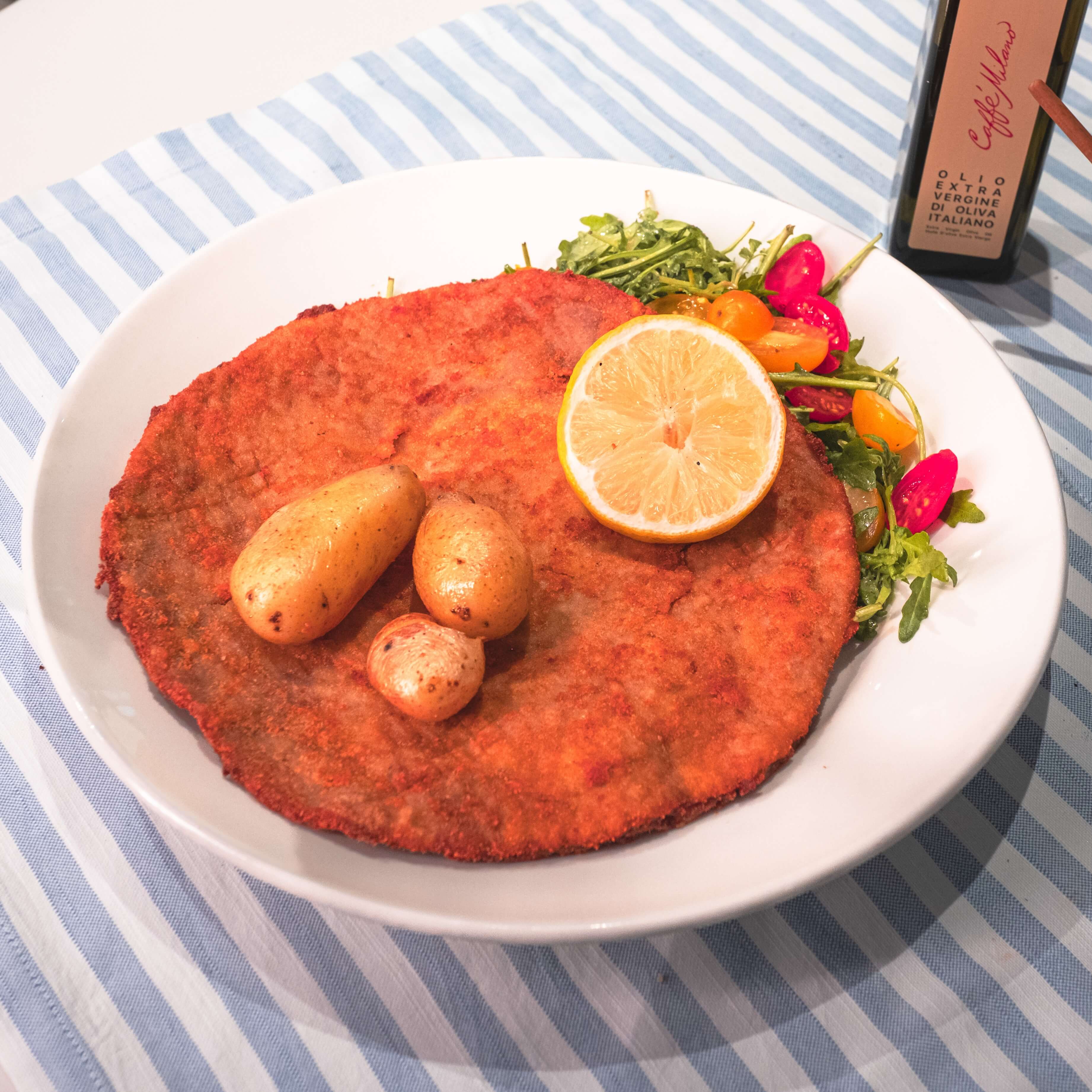 Our Classic Veal Milanese - Caffe Milano | Italian Restaurant Delivery in Monaco