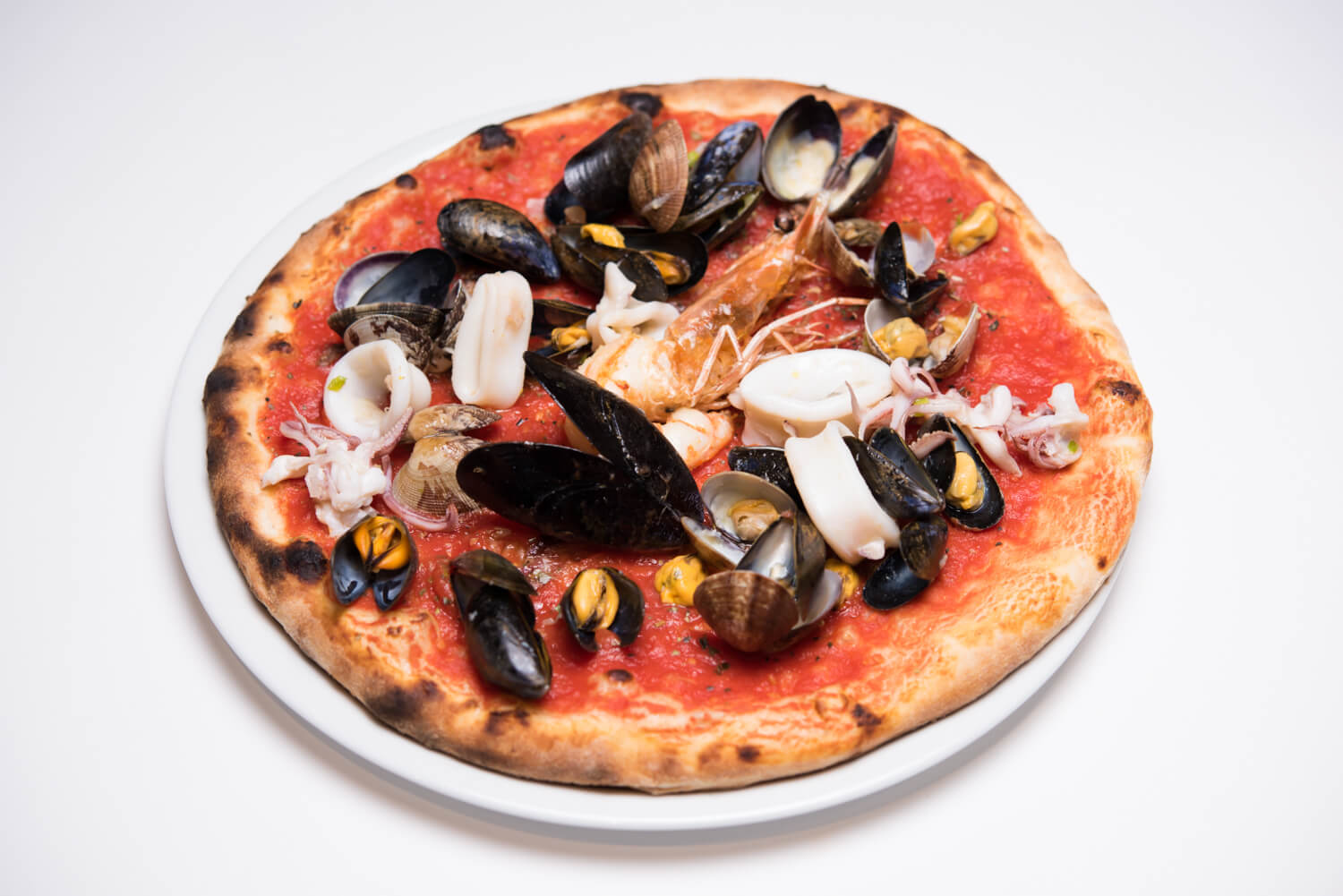 Pizza Fruits de mer - Bella Vita | Italian & French Cuisine Delivery in Monaco, Cap-d'Ail & Beausoleil
