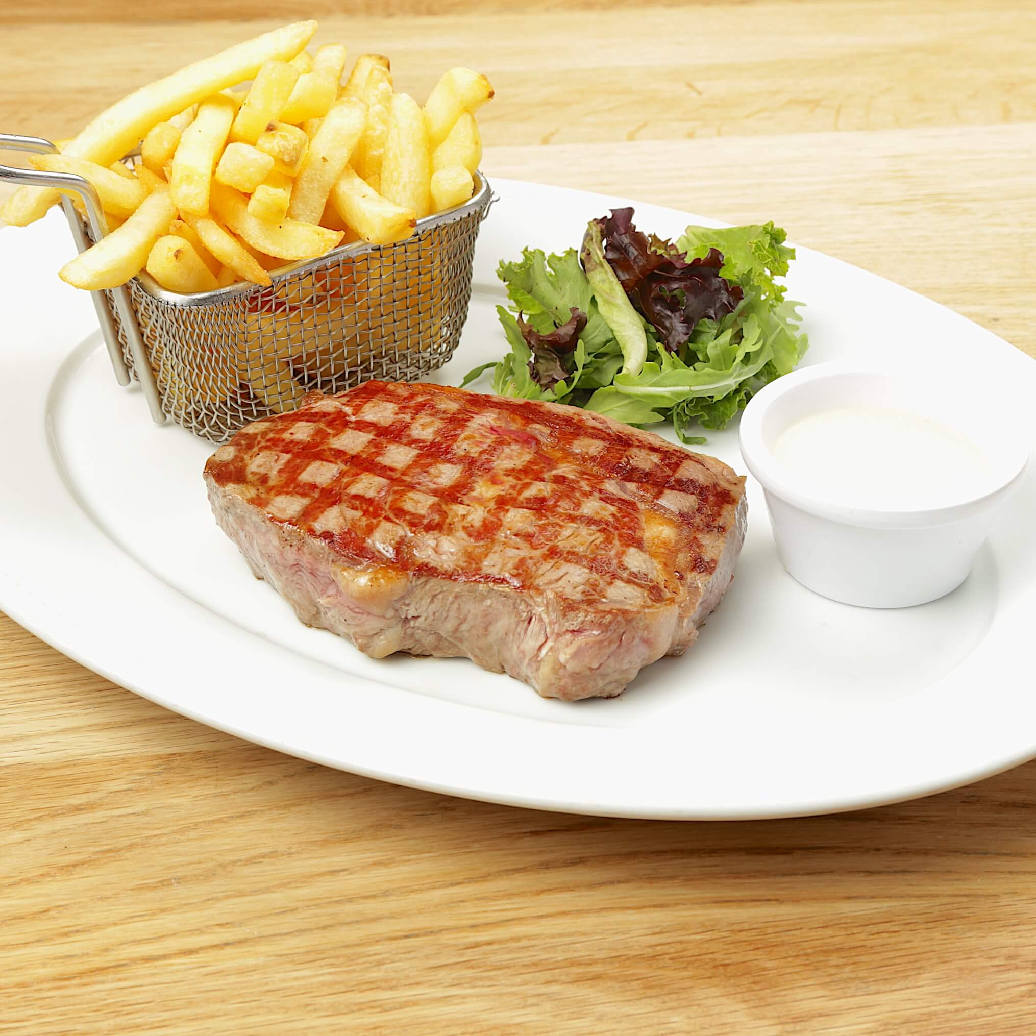 Rib Eye Steak Grilled Black Angus 300g with fries - Bella Vita | Italian & French Cuisine Delivery in Monaco, Cap-d'Ail & Beausoleil