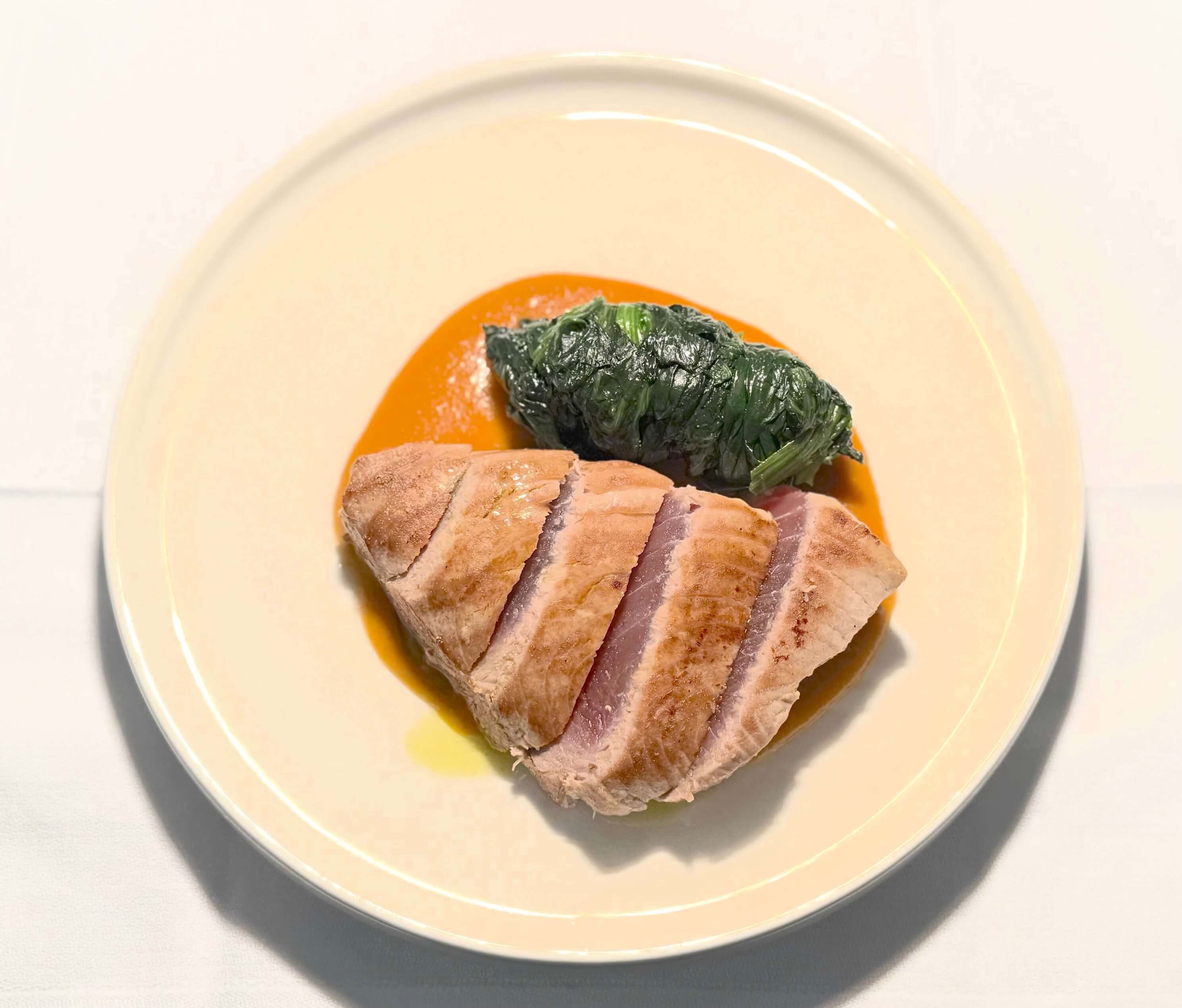 Seared tuna with sautéed spinach, garlic, oil, and chili - Avenue 31 | Mediterranean Cuisine Delivery in Monaco