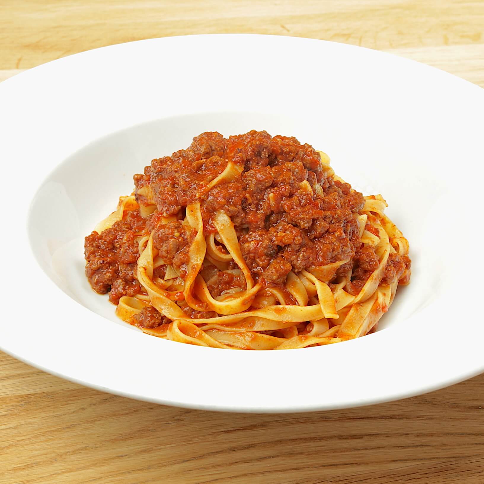 Tagliatelle in Bolognese Meat Sauce (100% Beef) - Bella Vita | Italian & French Cuisine Delivery in Monaco, Cap-d'Ail & Beausoleil