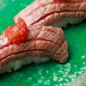 Toro flambé with tomato emulsion - 99 Sushi Bar