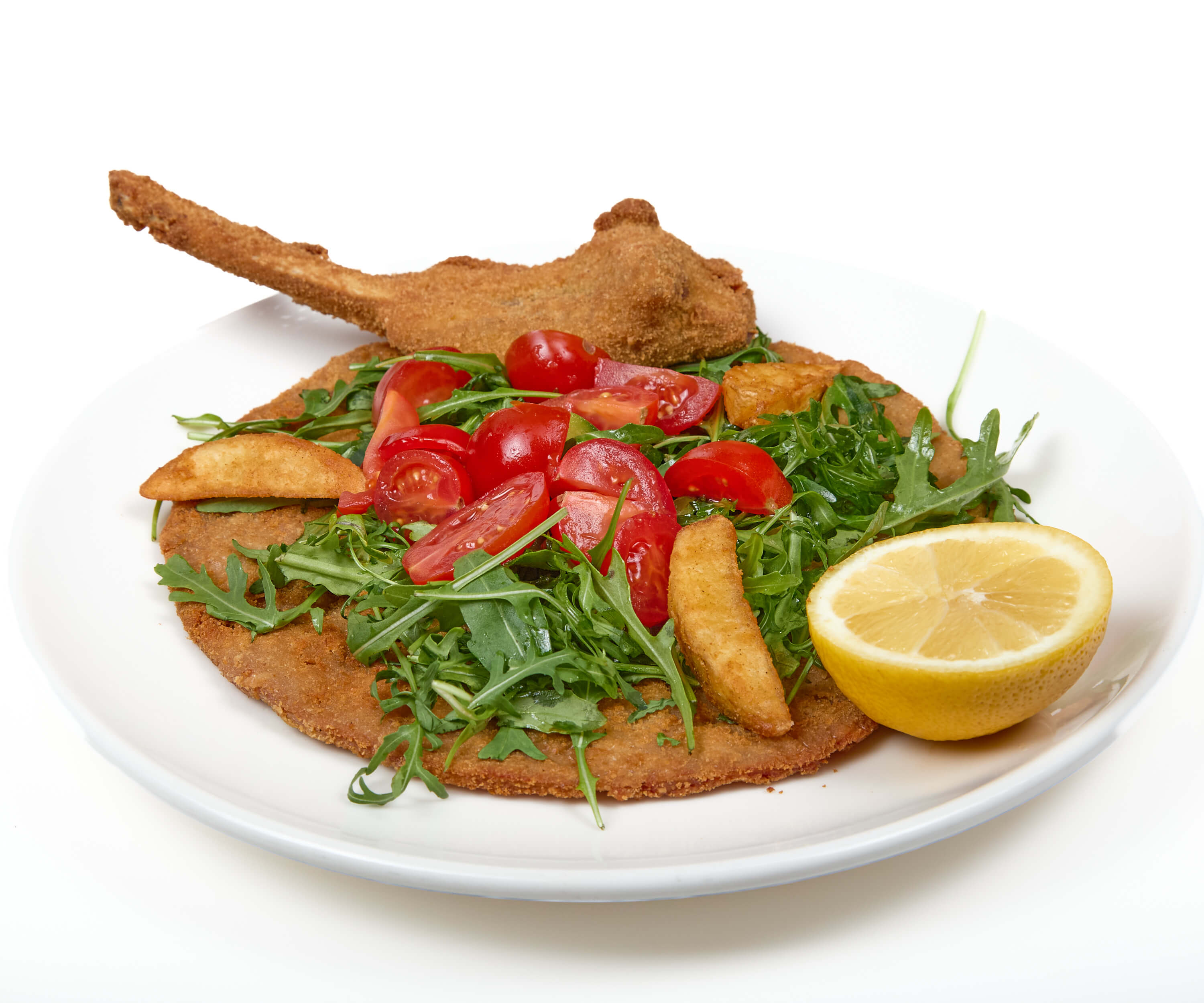 Veal Chop Milanese, Arugula, Cherry Tomatoes, and Oven-Baked Potatoes - La Saliere | Italian & Mediterranean Food Delivery in Monaco, Cap-d'Ail