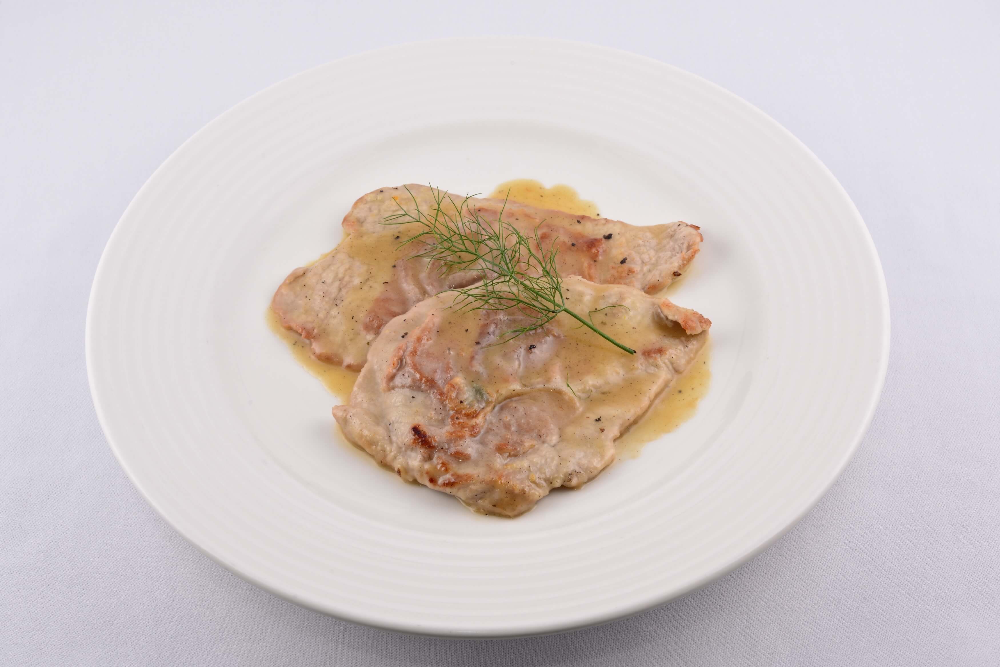 Veal Piccata with Lemon sauce - Pulcinella | Traditional Italian Pizza Delivery in Monaco