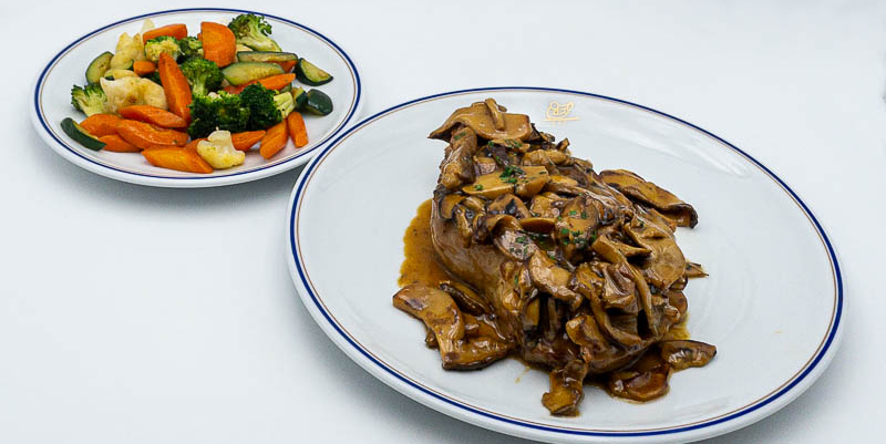 Veal chop with mushrooms - Odéon Café by Cipriani | Gourmet Italian Delivery in Monaco